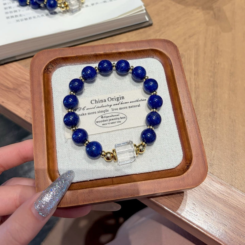 Hand‑made lapis lazuli beaded bracelet with gold metal accents, wholesale bulk