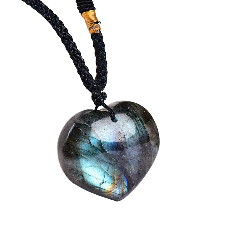 Wholesale natural labradorite heart pendant with amazing blue flash. Polished heart-shaped labradorite crystal on adjustable braided cord. Bulk supply for jewelry shops and crystal retailers.