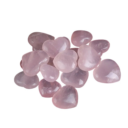 Wholesale natural polished rose quartz heart stones. Soft pink crystal hearts, great for crystal healing, decoration and jewelry making. Bulk supply for crystal retailers.