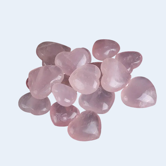 Wholesale natural polished rose quartz heart stones. Soft pink crystal hearts, great for crystal healing, decoration and jewelry making. Bulk supply for crystal retailers.