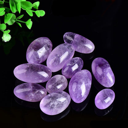 Wholesale polished tumbled amethyst stones. Smooth natural amethyst tumbles for crystal healing