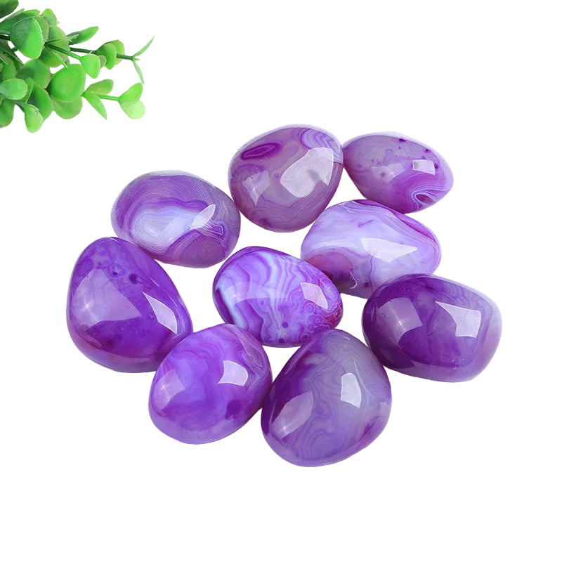 Wholesale natural purple lace banded agate tumbled palm stones. Polished smooth purple agate with beautiful banding patterns, great for crystal decor, healing, meditation and crystal shop bulk supply.