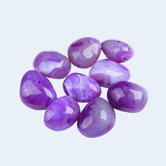 Wholesale natural purple lace banded agate tumbled palm stones. Polished smooth purple agate with beautiful banding patterns, great for crystal decor, healing, meditation and crystal shop bulk supply.