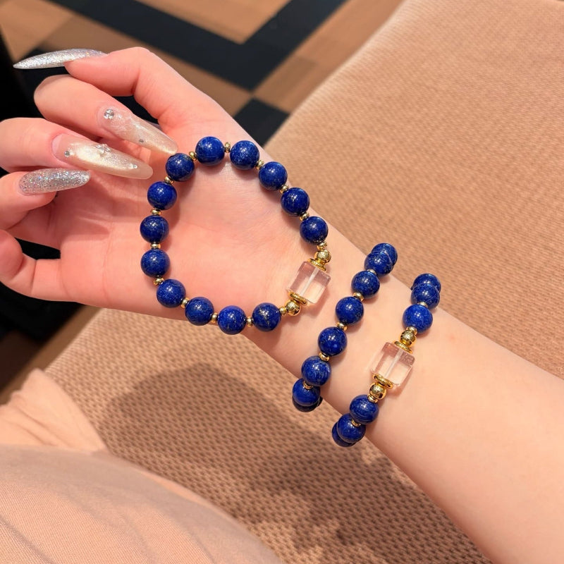 Hand‑made lapis lazuli beaded bracelet with gold metal accents, wholesale bulk