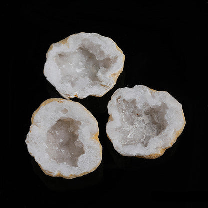 Clear quartz crystal points detail inside natural cut open agate geode half