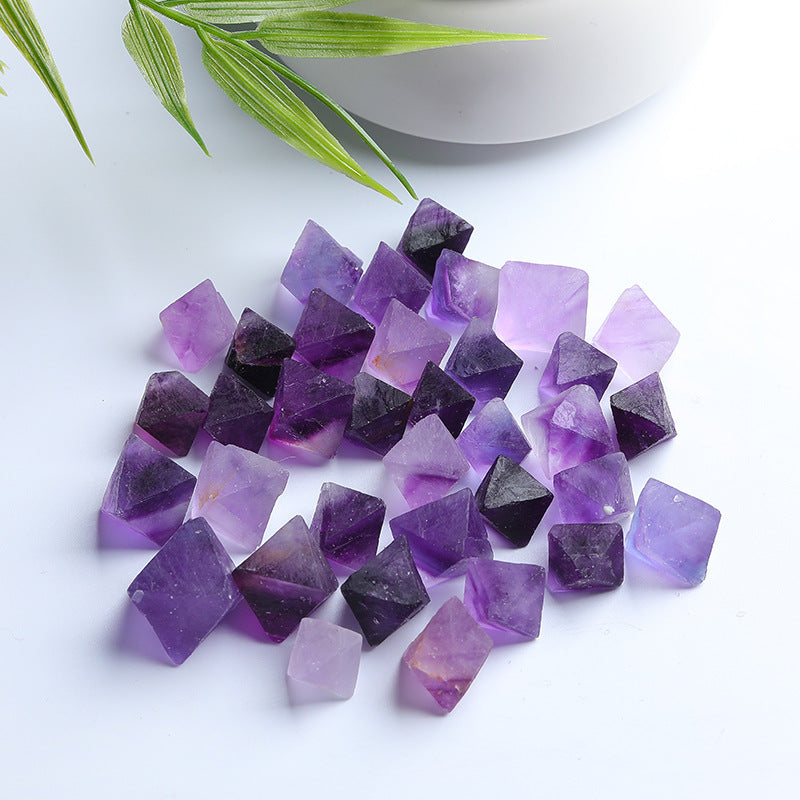 Wholesale natural amethyst diamond stones. Purple polished amethyst crystal pyramids, perfect for crystal healing, home decor and craft supplies. Bulk order available