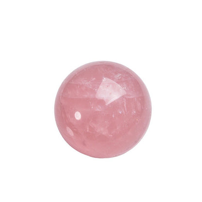 Deep pink rose quartz crystal ball on white background, wholesale crystal sphere for reseller