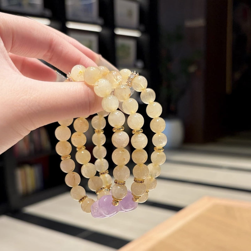Hand‑made gold-rutile-amethyst beaded bracelet with gold metal accents, wholesale bulk