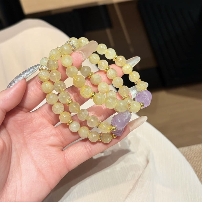Hand‑made gold-rutile-amethyst beaded bracelet with gold metal accents, wholesale bulk