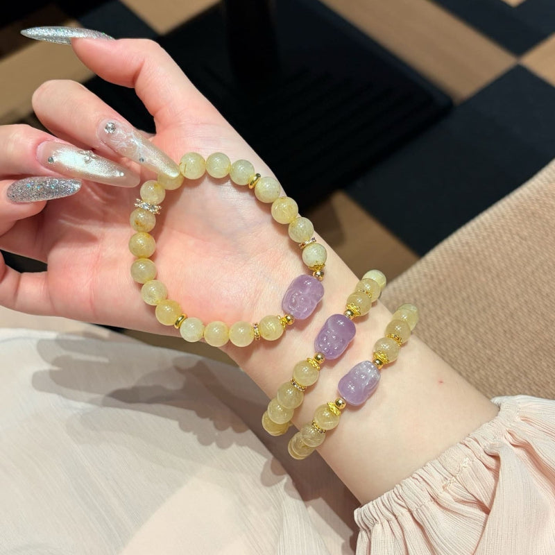 Hand‑made gold-rutile-amethyst beaded bracelet with gold metal accents, wholesale bulk