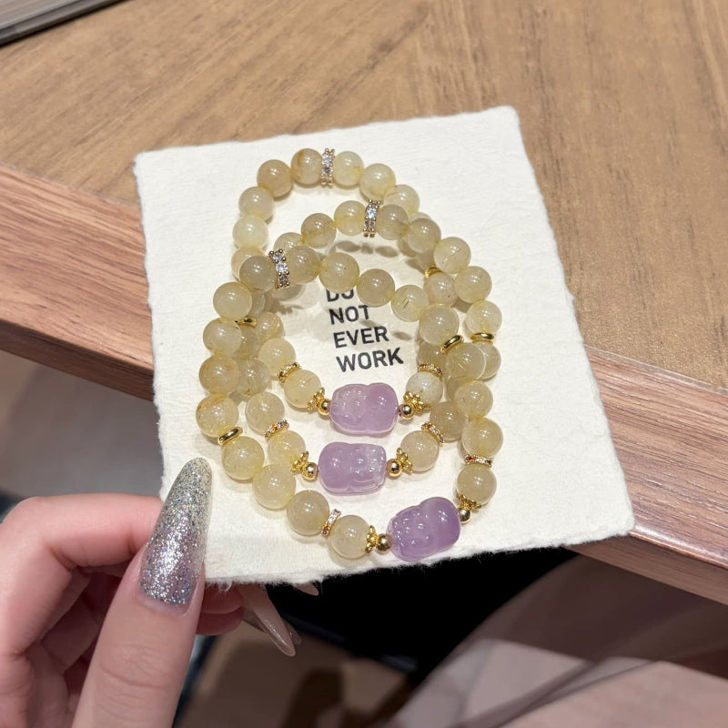 Hand‑made gold-rutile-amethyst beaded bracelet with gold metal accents, wholesale bulk