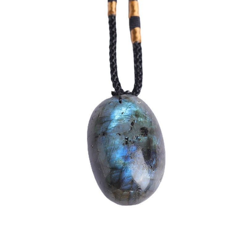 Texture detail of labradorite spectrolite stone, natural blue iridescent flash