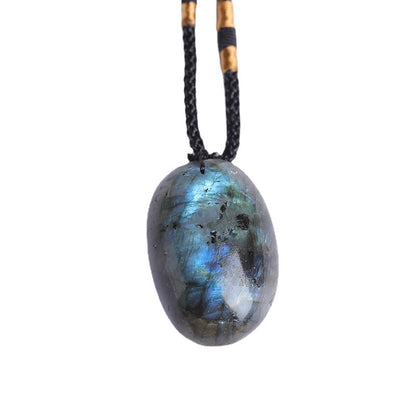 Texture detail of labradorite spectrolite stone, natural blue iridescent flash