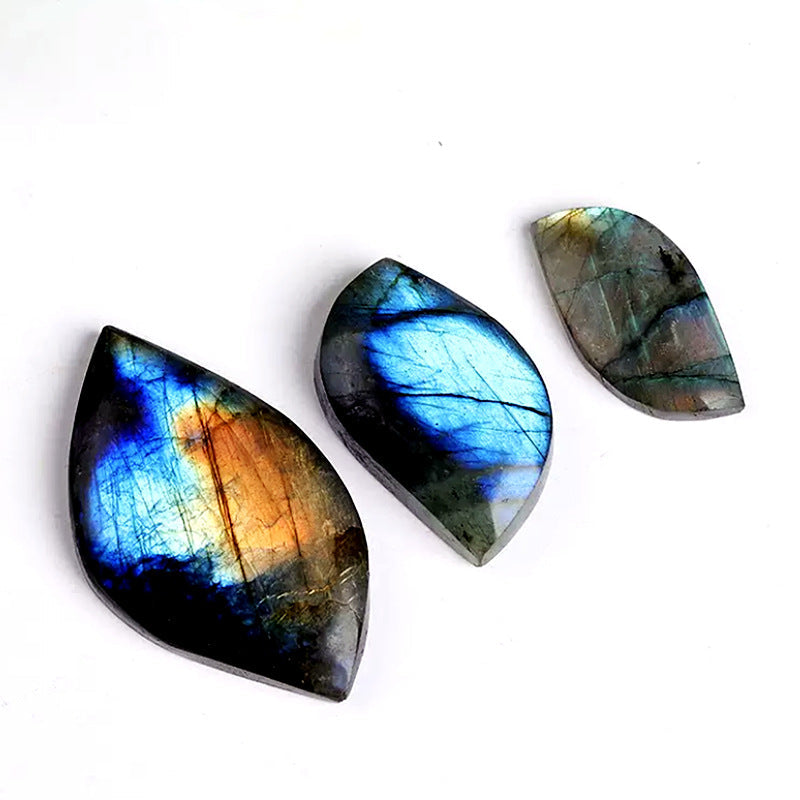 Close up of natural blue flash labradorite leaf cabochon loose stone