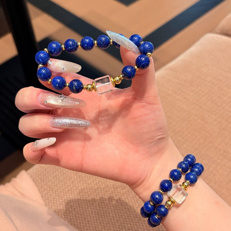 Hand‑made lapis lazuli beaded bracelet with gold metal accents, wholesale bulk