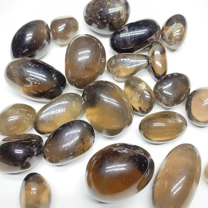 1. Loose Pile of Natural Smoky Quartz Tumbled Stones, Polished Smoky Quartz Crystals for Wholesale
2.