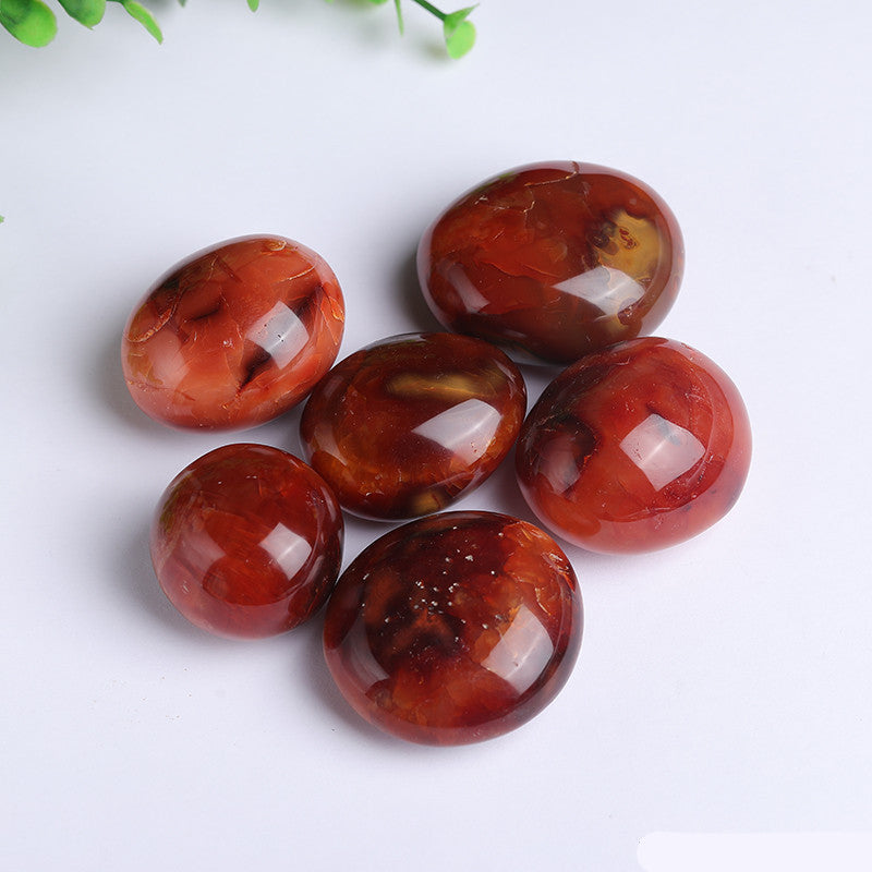 Red agate stone natural texture, tumbled crystal